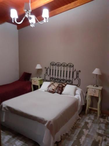 Ένα ή περισσότερα κρεβάτια σε δωμάτιο στο La Ernestina
