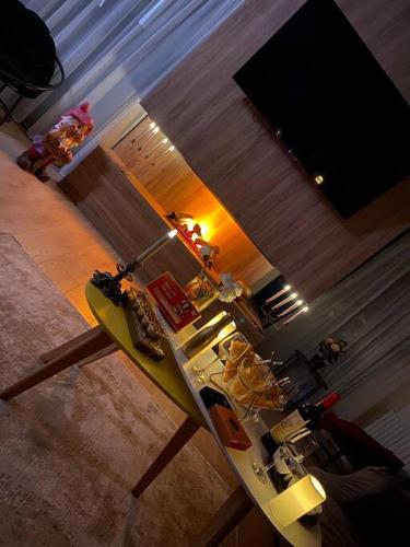 a table with food on it in a living room at Duplex in four seasons new gudauri near gondola in Gudauri