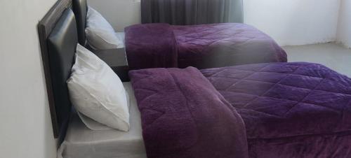Tempat tidur dalam kamar di Magic view apartment