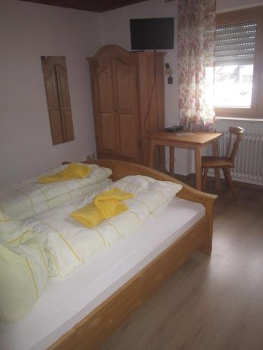 Postel nebo postele na pokoji v ubytování Hotel Garni Austermayer