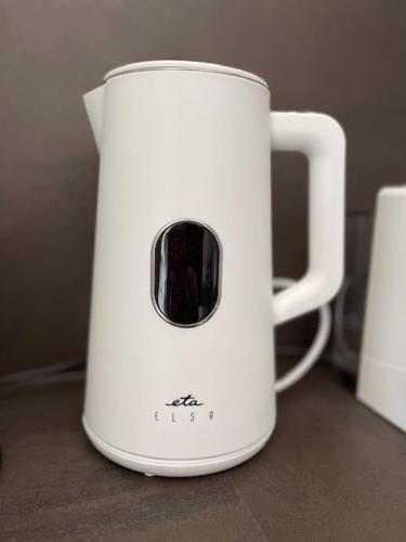 a white blender sitting on top of a counter at KLINOVEC APARTMENTS LUXURY in Loučná pod Klínovcem