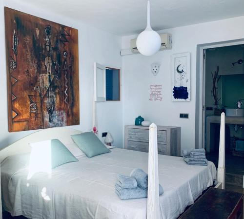 Postel nebo postele na pokoji v ubytování Casa Mariposa