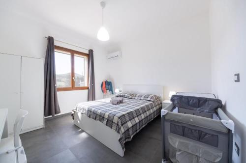 Postel nebo postele na pokoji v ubytování B&B Il Sogno di Mario