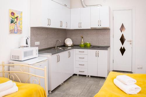 Una cocina o zona de cocina en G-Point New Beach