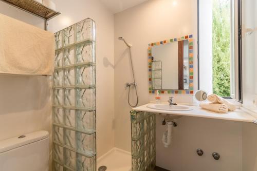 a bathroom with a shower and a sink and a mirror at Son serra de marina - 27077 Mallorca in Son Serra de Marina