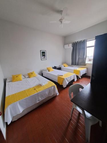 Postel nebo postele na pokoji v ubytování Hotel Panorama, Cuiabá