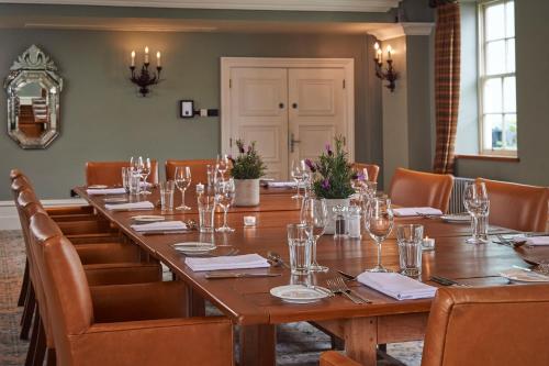 a conference room with a long table and chairs at Hotel du Vin & Bistro Harrogate in Harrogate