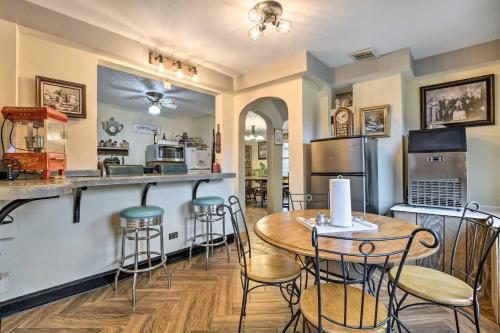 a kitchen with a table and chairs in a room at Pet-Friendly Bartlett Farmhouse with Deck! in Bartlett