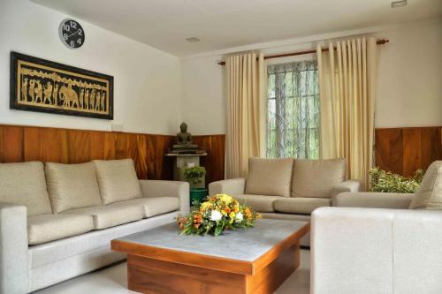 Posezení v ubytování Kandy Dawson Bungalow