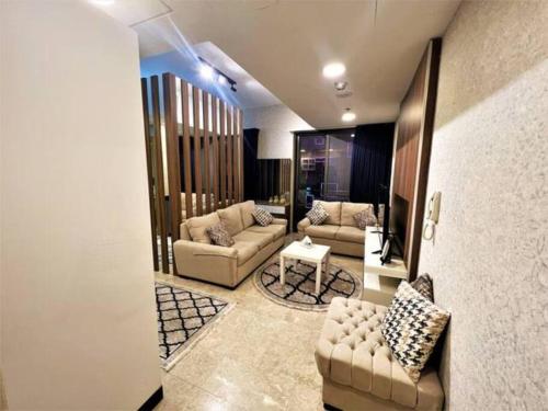 Nice cozy studio in Damac Tower Amman 1104 tesisinde bir oturma alanı