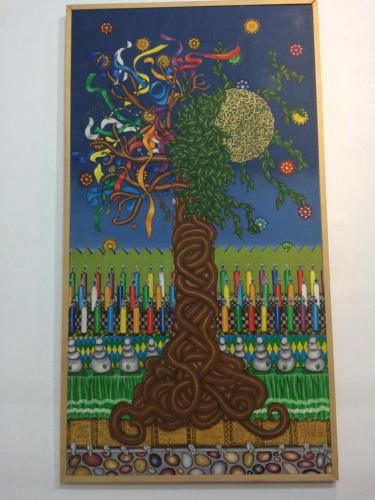 a painting of a tree in front of a fence at Dar Halima in Essaouira