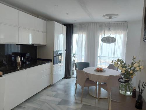 2 BR Beachfront apartment in Estepona, Malaga.