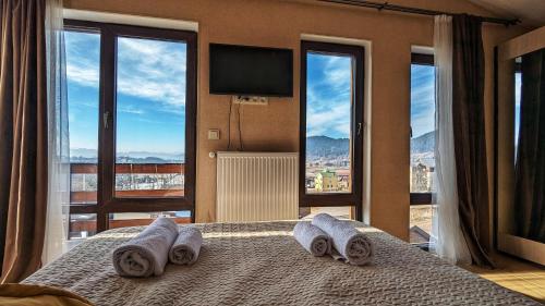 Postel nebo postele na pokoji v ubytování 7 Cottage in Bakuriani