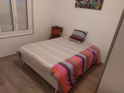 Posteľ alebo postele v izbe v ubytovaní Gîte d'Helen