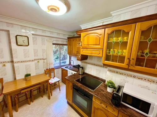 Η κουζίνα ή μικρή κουζίνα στο La Casina del Lavadero de Cudillero