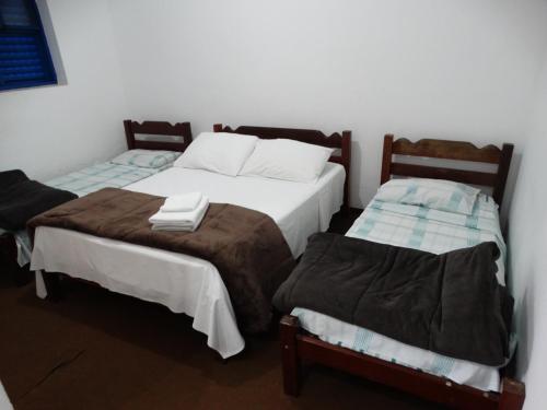Katil atau katil-katil dalam bilik di Tapiratiba Hotel