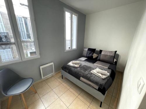 Posteľ alebo postele v izbe v ubytovaní Appartement T2 pour 3 personnes