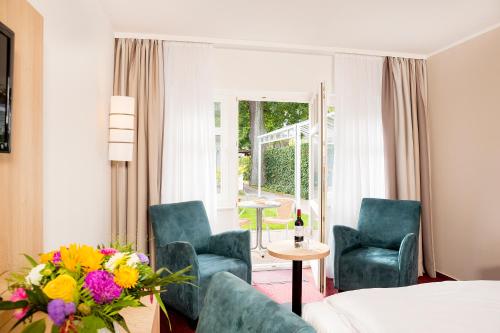 Χώρος καθιστικού στο Garni Eden Hotels