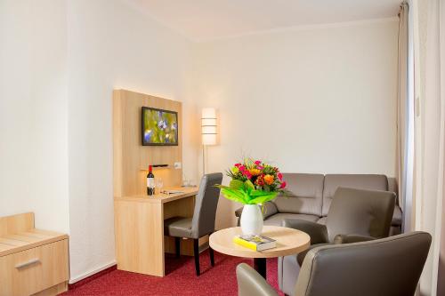 Χώρος καθιστικού στο Garni Eden Hotels