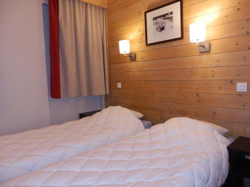 เตียงในห้องที่ Appartement Avoriaz, 3 pièces, 7 personnes - FR-1-634-10