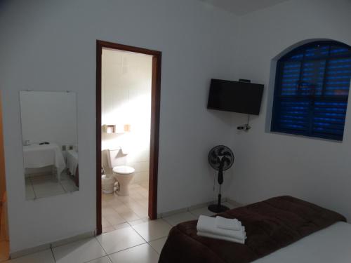 Katil atau katil-katil dalam bilik di Tapiratiba Hotel