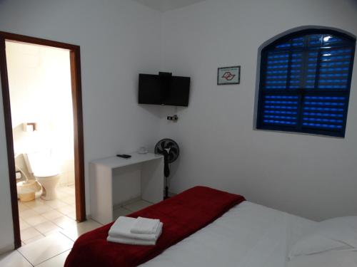Katil atau katil-katil dalam bilik di Tapiratiba Hotel