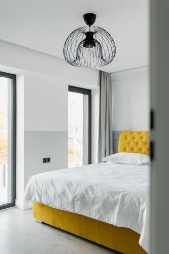 Postel nebo postele na pokoji v ubytování Aparthotel Nest Inn Meteor