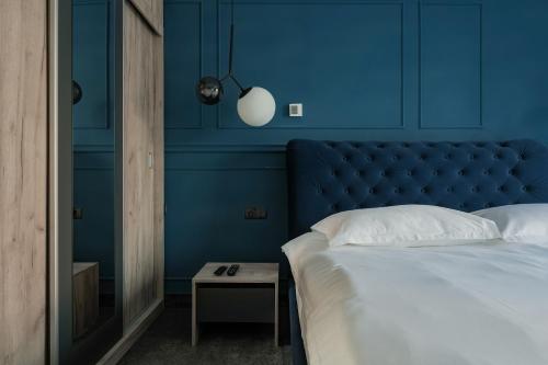 Postel nebo postele na pokoji v ubytování Aparthotel Nest Inn Meteor