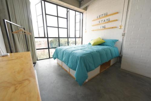 Cama o camas de una habitación en Indie Studio
