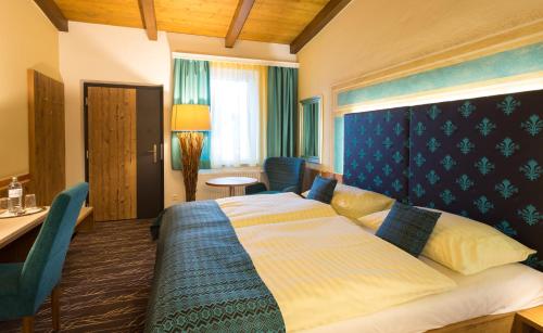 Cama o camas de una habitación en Hotel Schlof Guat