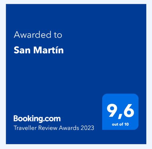 a blue sign that reads awarded to san martin at Vivienda Turística San Martín in Sotés
