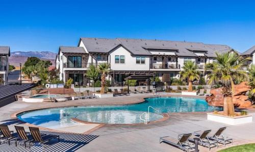 a large house with a swimming pool and a resort at Ocotillo Springs Resort 45 l Brand New Property, Private Pool, Hot Tub, & Community Pool in Santa Clara
