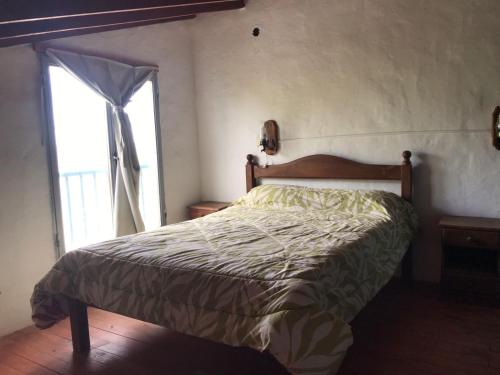 Ένα ή περισσότερα κρεβάτια σε δωμάτιο στο Los soles y el Mar