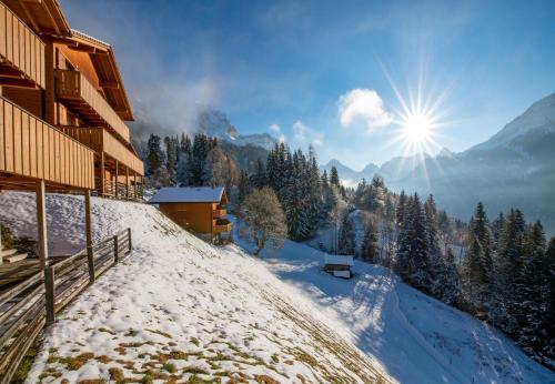 a ski lodge in the mountains in the snow at Racers Retreat 10 in Wengen