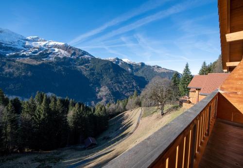 a balcony with a view of the mountains at Racers Retreat 10 in Wengen