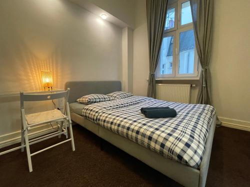 Katil atau katil-katil dalam bilik di Spokojny Sen Quiet Rooms in Old Town