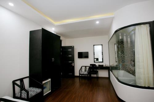 Μια τηλεόραση ή/και κέντρο ψυχαγωγίας στο Hoianation Villas Hotel