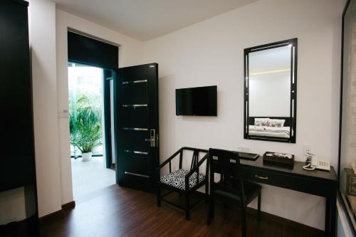 Μια τηλεόραση ή/και κέντρο ψυχαγωγίας στο Hoianation Villas Hotel
