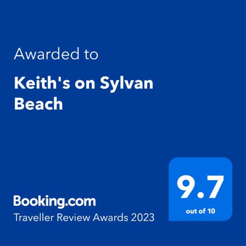 una pantalla azul con el texto otorgado a kitts en la playa de Syllvan en Keith's on Sylvan Beach, 1 of the 3 most popular units on Bribie, en Bellara