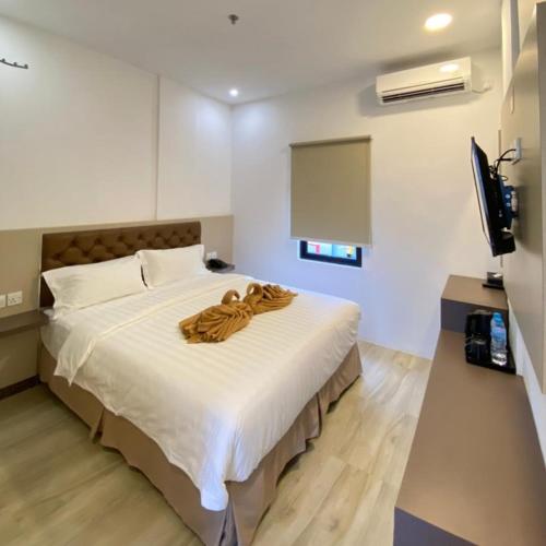 BATAM 1 HOTELにあるベッド