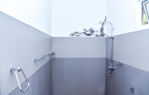 Koupelna v ubytování Ella Nimal Nest Inn