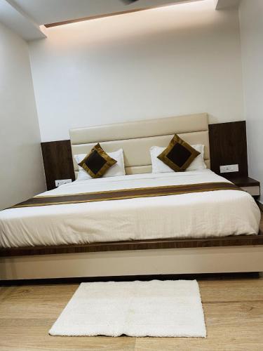 Ένα ή περισσότερα κρεβάτια σε δωμάτιο στο Hotel Banaras Villa