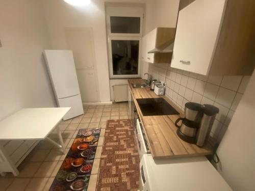 Η κουζίνα ή μικρή κουζίνα στο Ruhige gemütliche Wohnung Altbau in zentraler Lage Wiesbaden