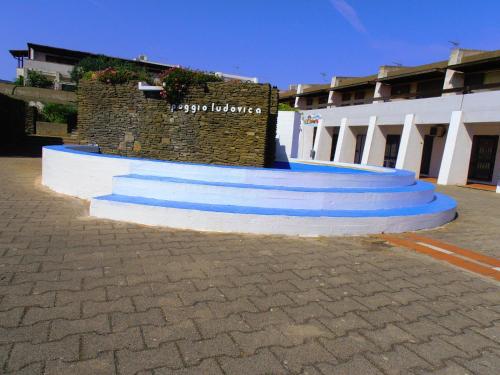 Swimmingpoolen hos eller tæt på La Dea Madre