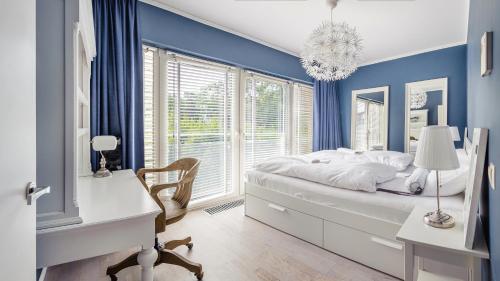 Posteľ alebo postele v izbe v ubytovaní Apartamenty Sun & Snow Playa Baltis z sauną