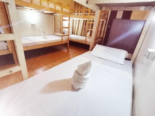 an overhead view of a room with two beds at Coron town travellers inn in Coron