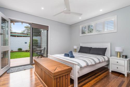 Ένα ή περισσότερα κρεβάτια σε δωμάτιο στο Blue Beach House, 9 Cross Street, Port Macquarie