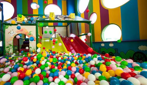 a large pile of balls in a playground at Elexus Hotel Resort & Spa & Casino in Kérynia