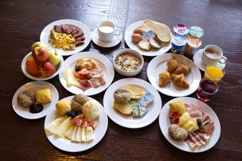 a group of plates of food on a table at Mediterranean Village San Antonio in Biograd na Moru