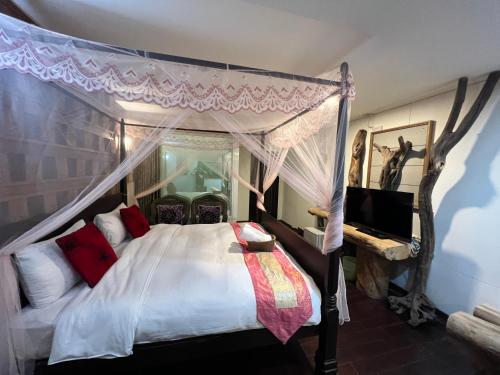 Postel nebo postele na pokoji v ubytování Ming Jun Homestay